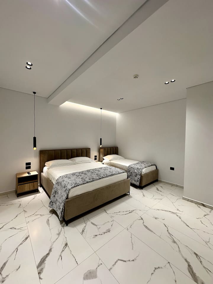 Superior Triple Room with a double and a single bed