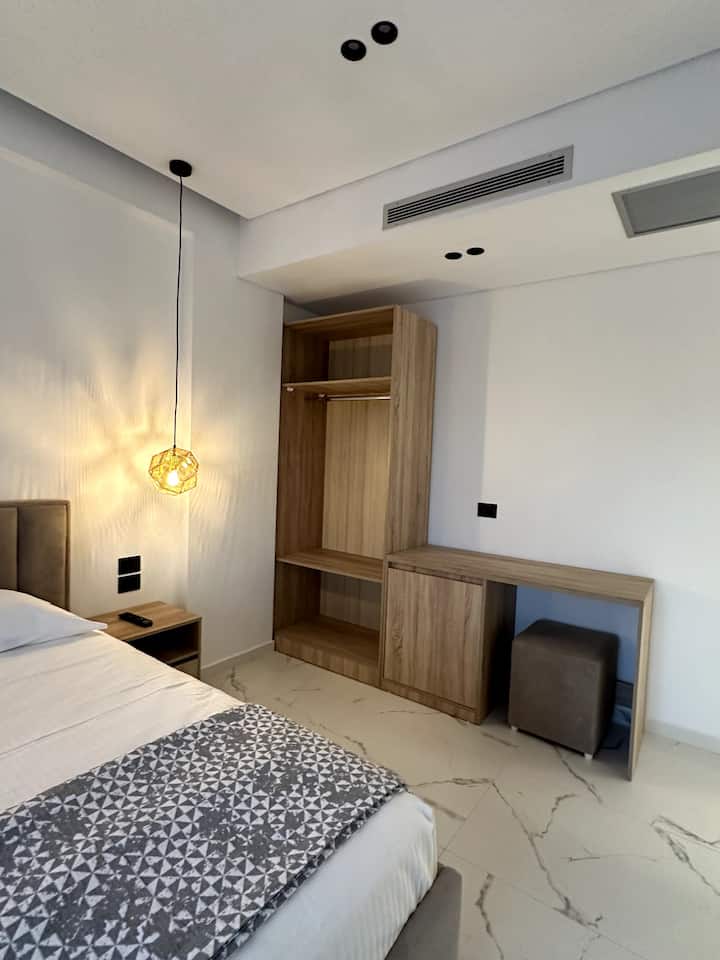 Work desk and wardrobe in a Superior Double Room