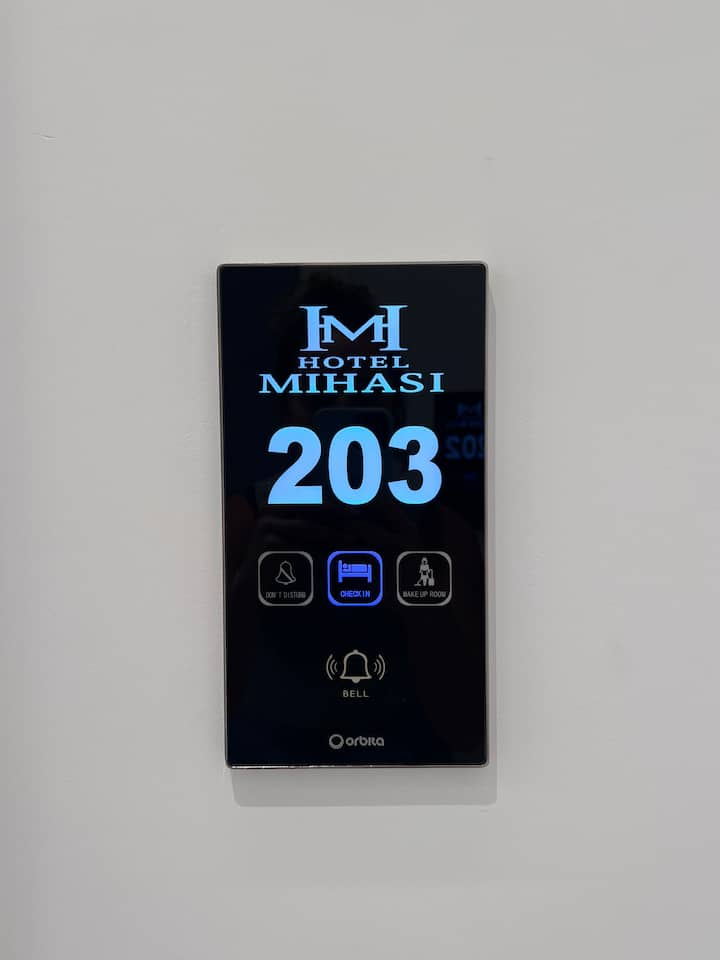 Digital room panel with key-card access at the room door